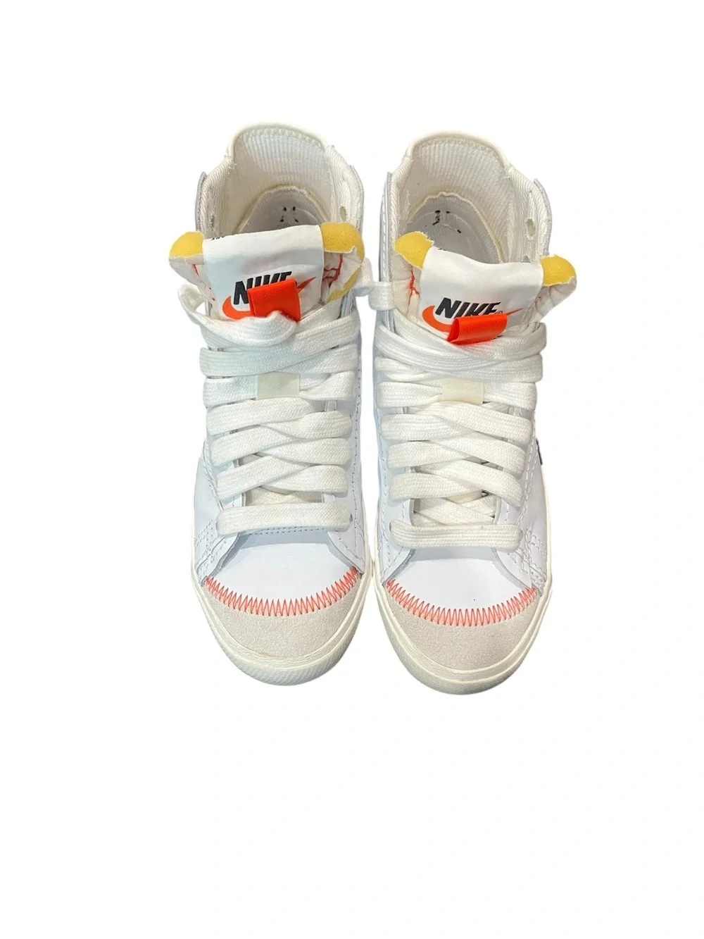 Nike Blazer Mid '77 Jumbo sneakers in a white and orange colorway